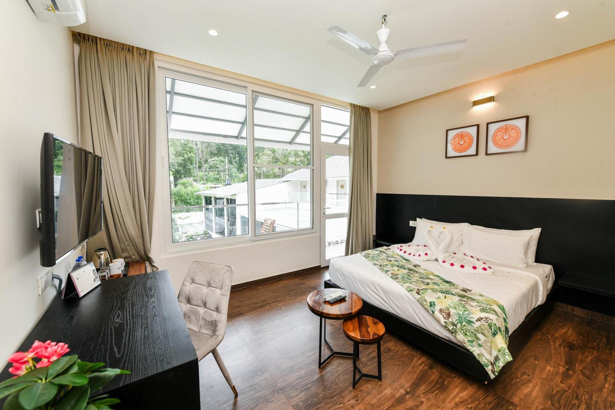 Inventree Aranya Resort & Spa Мадікері Екстер'єр фото